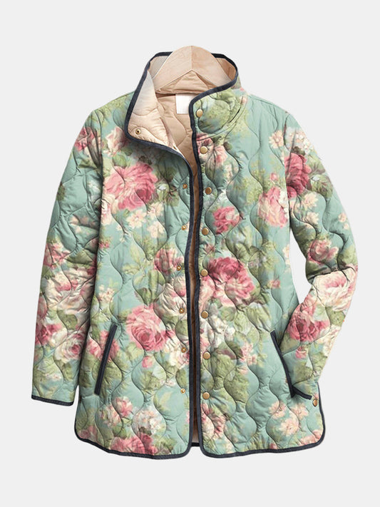 Rosemary quilted jacket shown flat: large vintage roses on muted sage green with dark piping and stand collar