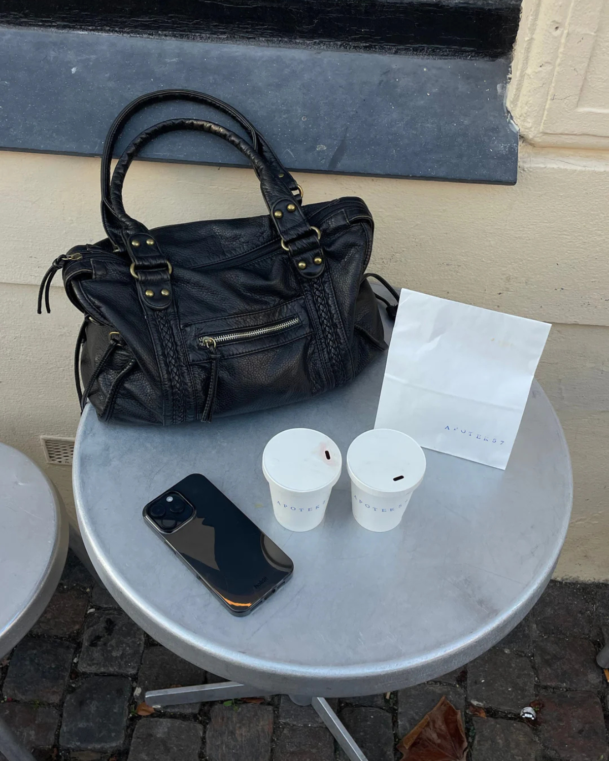 Edyisa black leather city bag carried crossbody