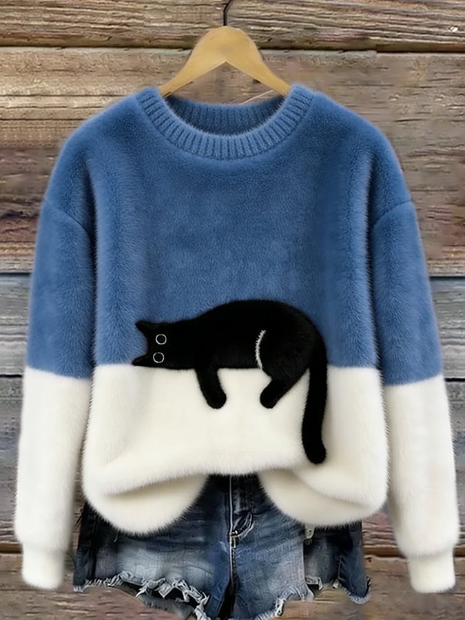 Bonnie cat print oversized sweater in blue with a sleeping cat across the cream color-block front