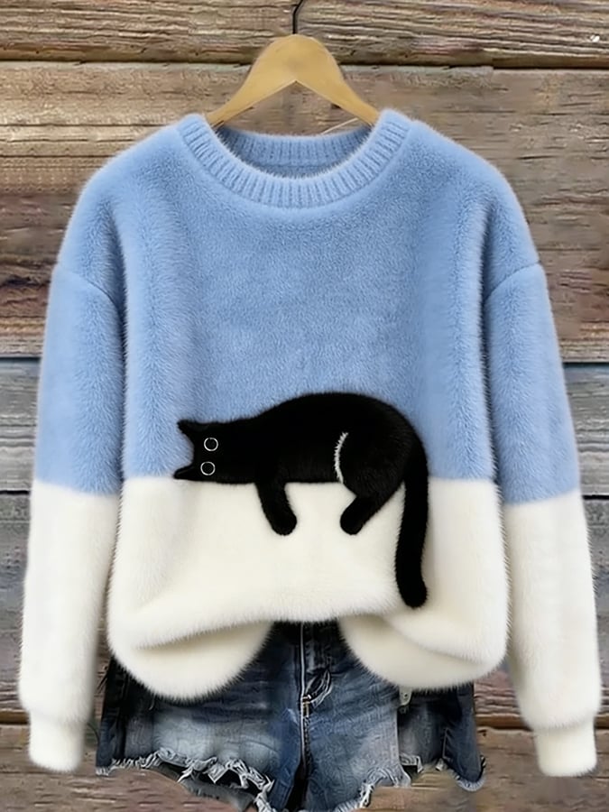Bonnie cat print oversized sweater in light blue with a sleeping cat across the cream color-block front