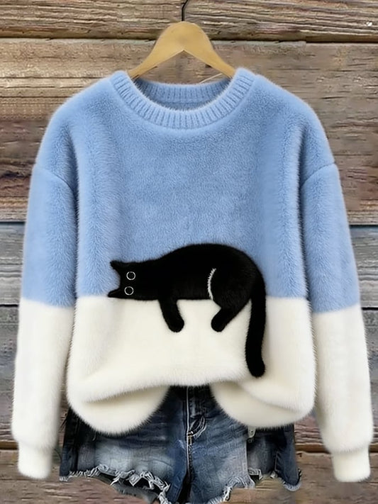 Bonnie cat print oversized sweater in light blue with a sleeping cat across the cream color-block front