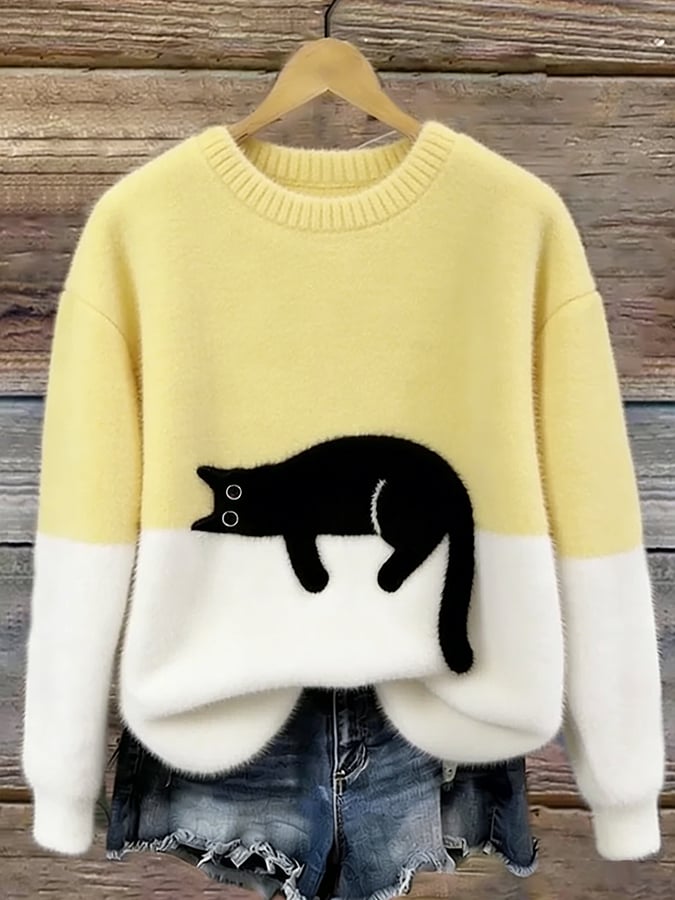Bonnie cat print oversized sweater in yellow with a sleeping cat across the cream color-block front