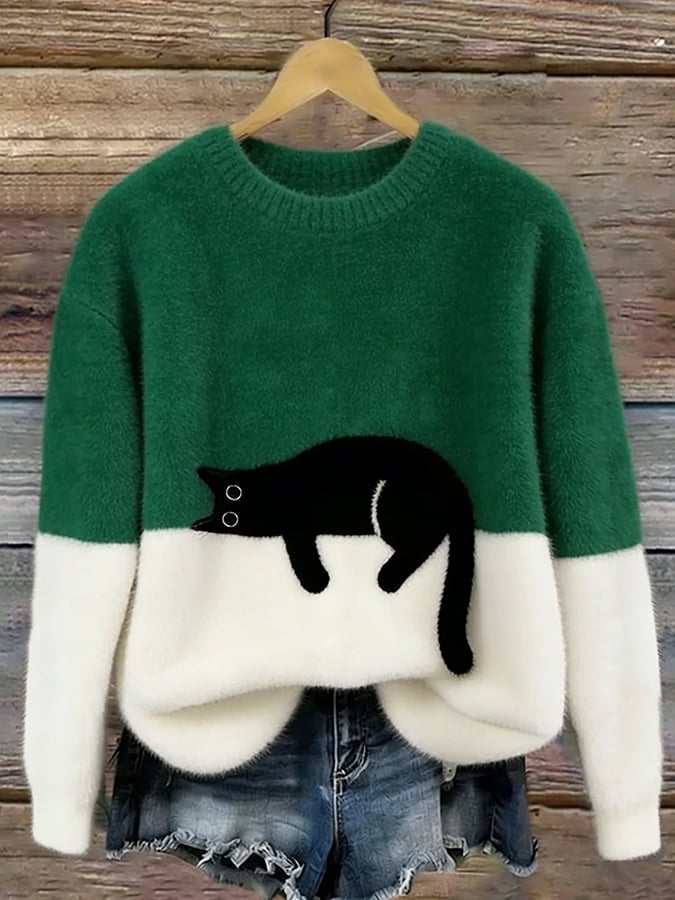 Bonnie cat print oversized sweater in green with a sleeping cat across the cream color-block front