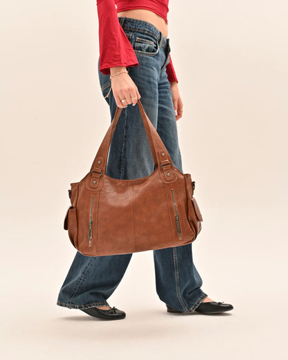 Side view of the Edyisa camel vegan leather shoulder bag
