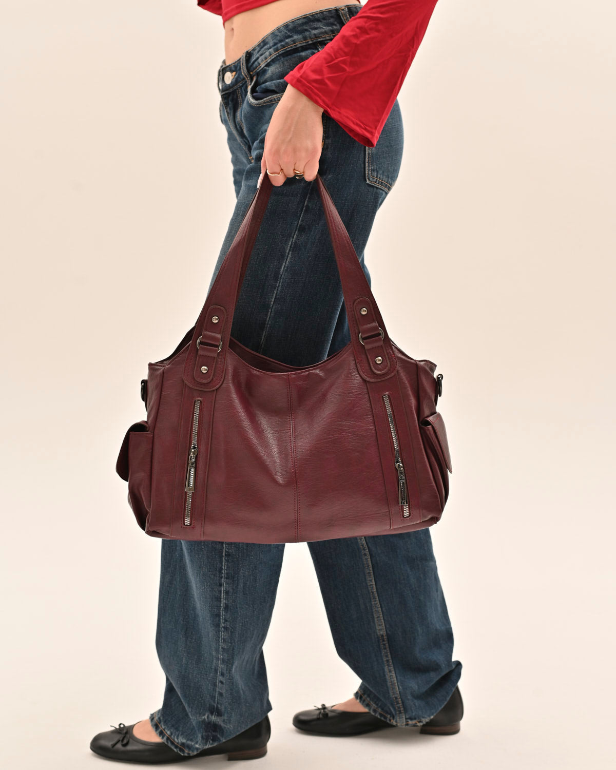 Edyisa burgundy shoulder bag open, showing the roomy interior