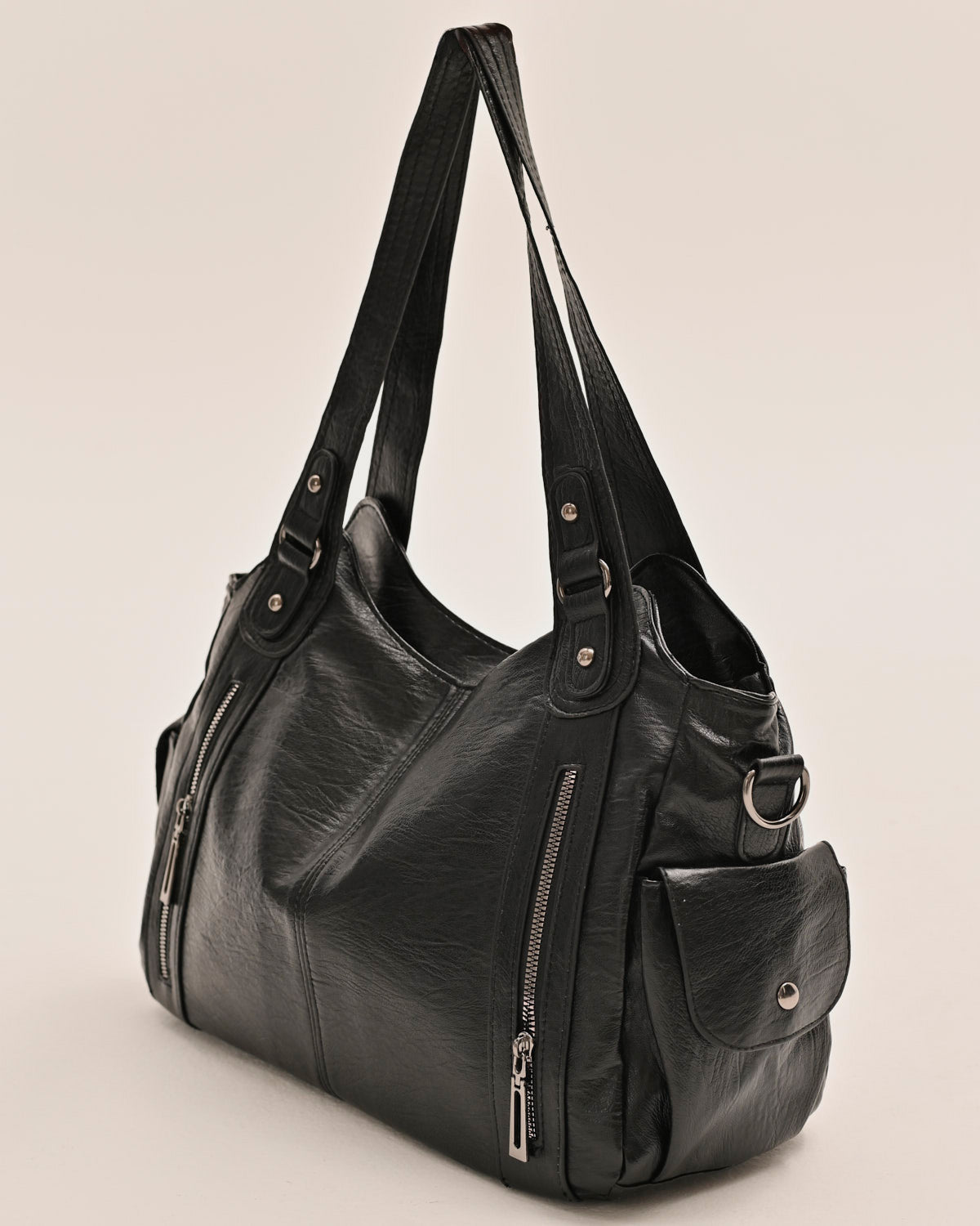Edyisa black shoulder bag open, showing the roomy interior
