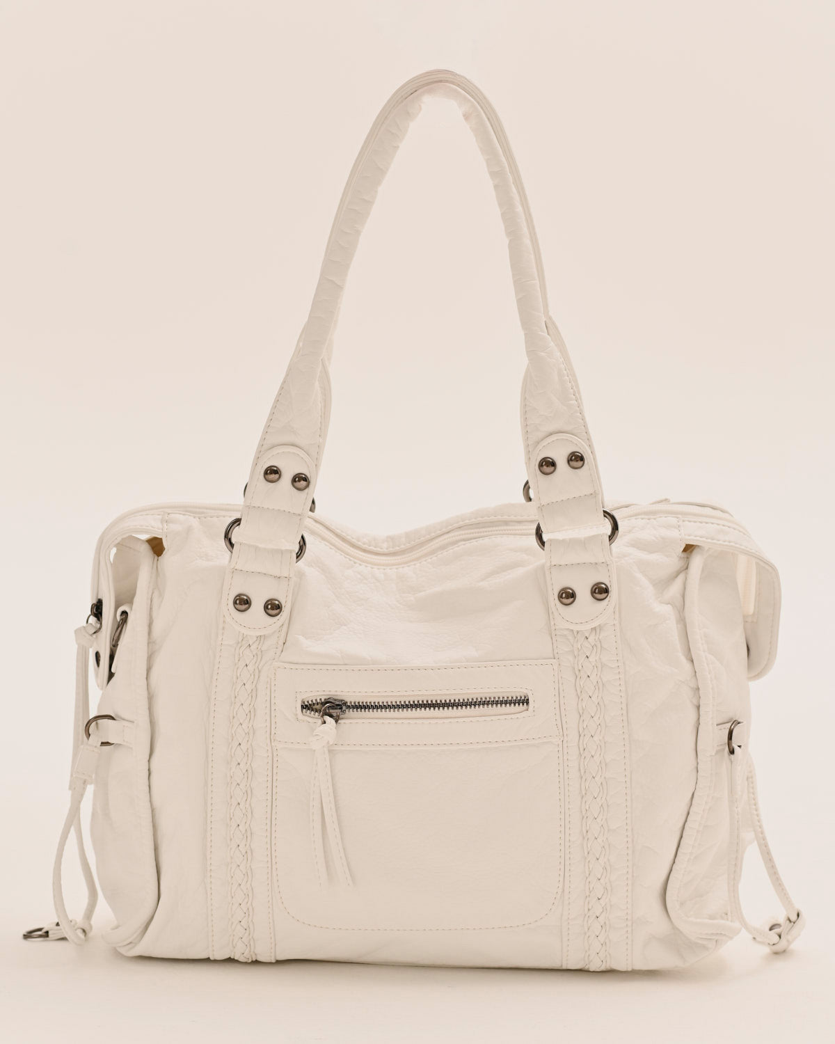 Detail of the zip closure on the Edyisa white leather city bag