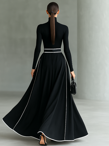 Back view of the Odette black turtleneck maxi dress with white trim along the hem
