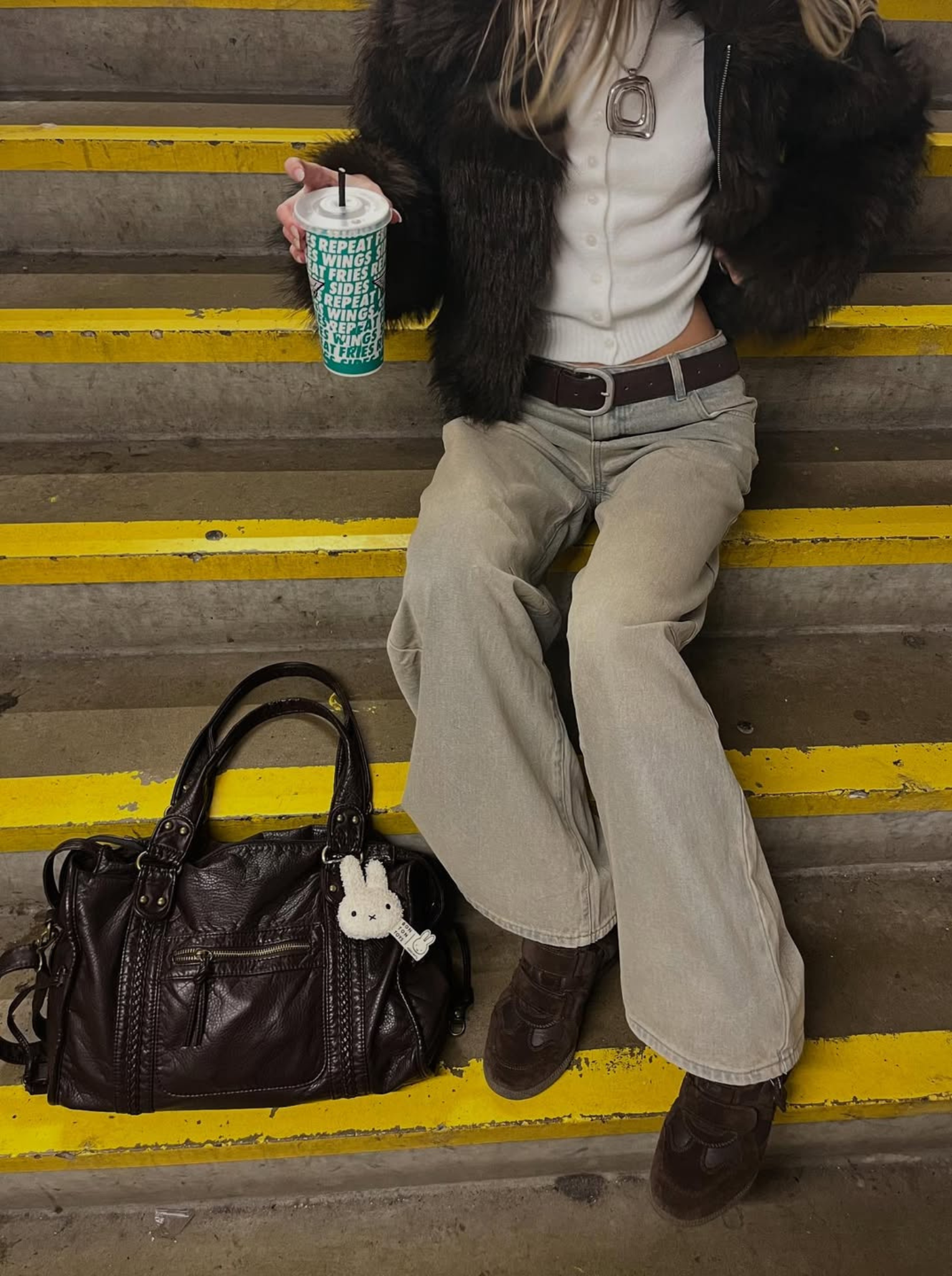Edyisa dark brown leather city bag styled with a fall outfit