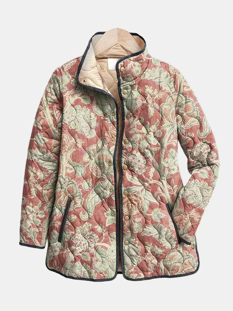 Georgina quilted jacket shown flat: sage damask scrolls on rosy terracotta with dark piping and stand collar