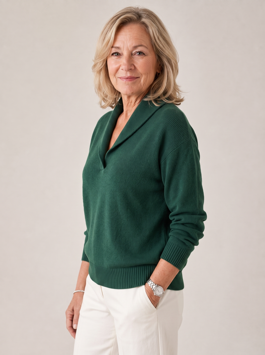 Woman wearing the Greta shawl collar sweater in forest green, side view showing the dropped shoulders and relaxed fit