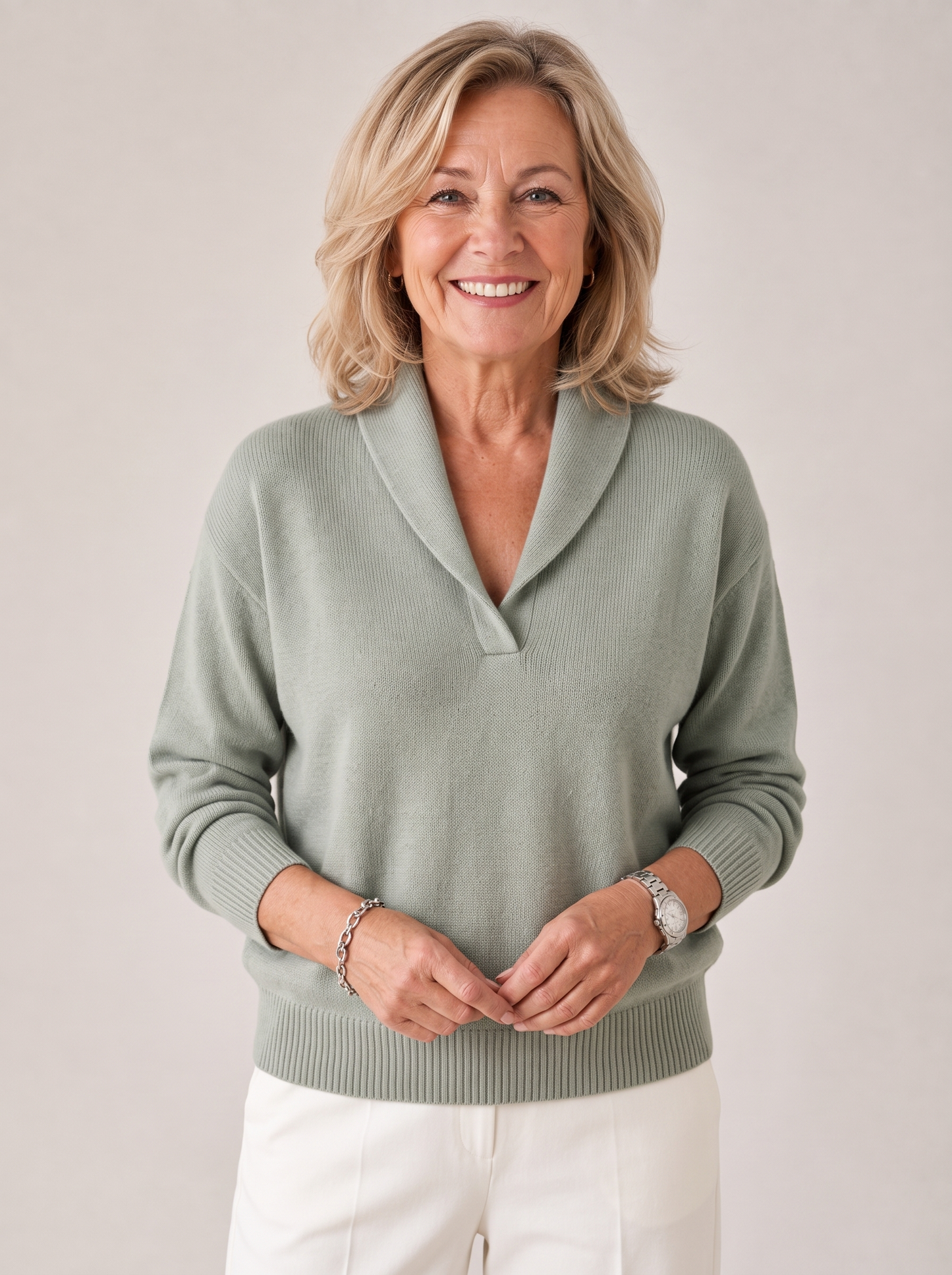 Greta shawl collar sweater in sage green, worn front view