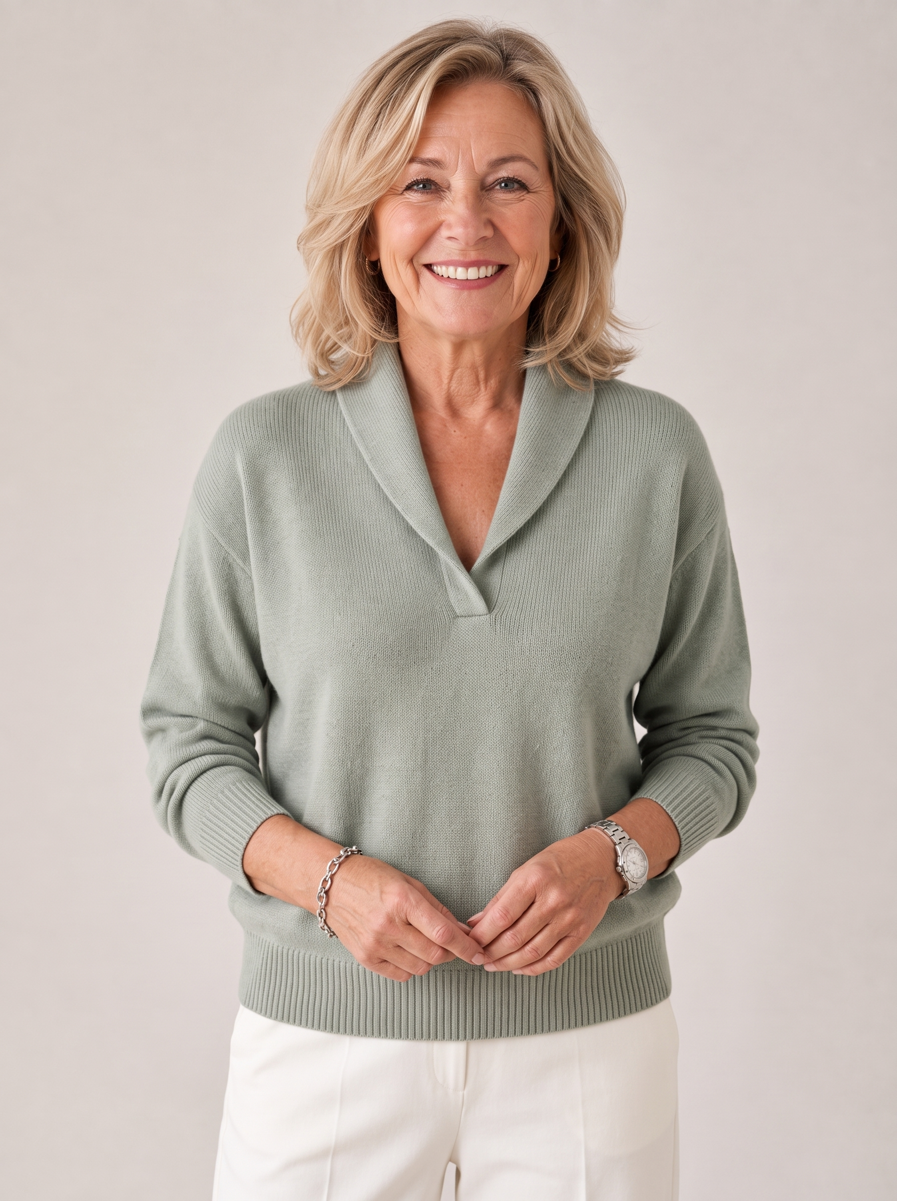 Greta shawl collar sweater in sage green, worn front view